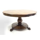 Early Victorian mahogany tilt top breakfast table, shaped chamfered top with segmented starburst fig