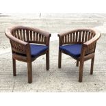 Pair teak garden armchairs, curved backs and serpentine slatted seats, with seat cushions, W84cm