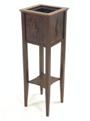 Early 20th century oak square plant stand with metal liner, the sides decorated with stepped lozenge