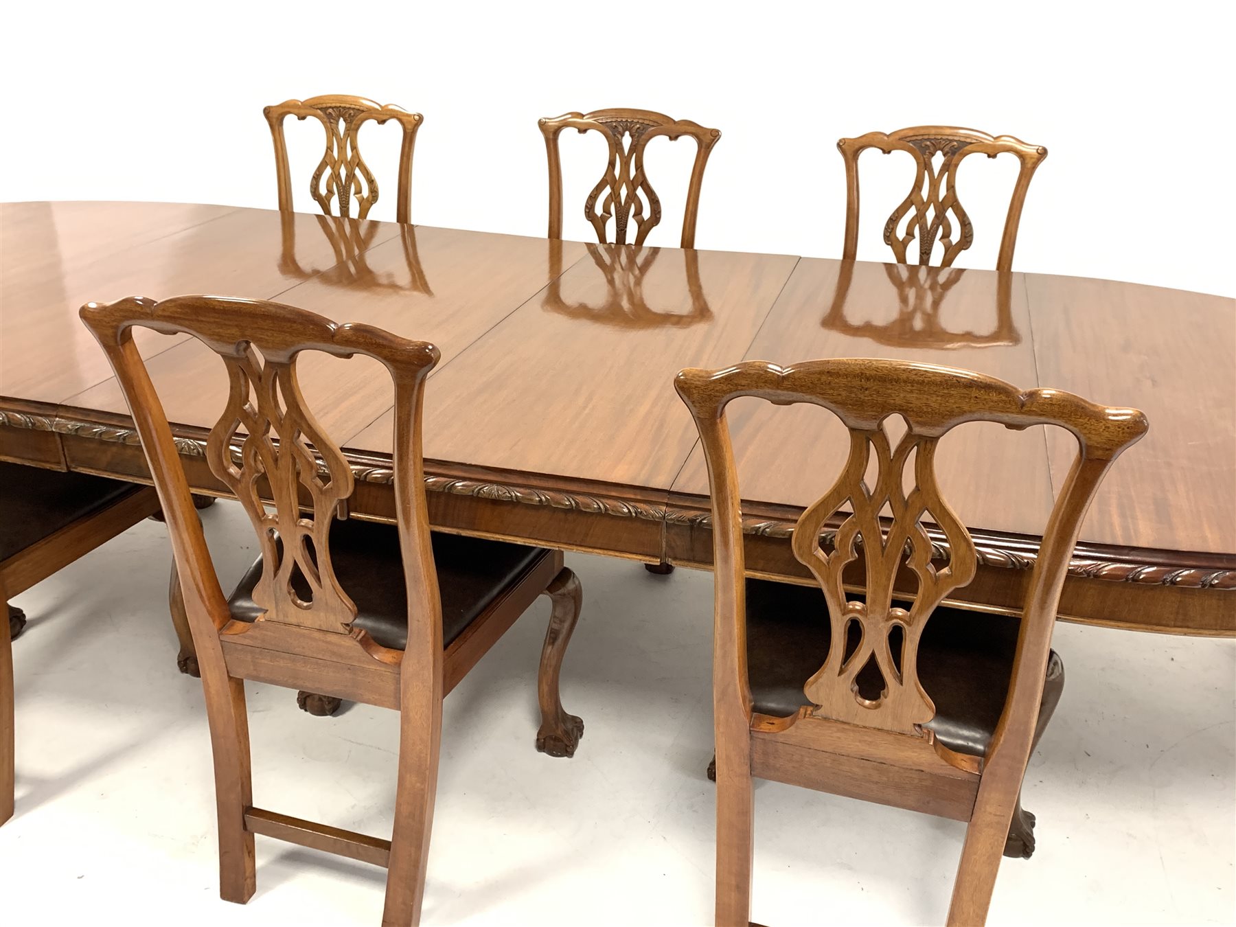 Early 20th century mahogany dining table, oval gadroon carved telescopic extending top with four add - Image 6 of 9