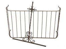 Wrought iron fire fence (W137cm, H73cm, D46cm), and a wrought iron upright with scrolls