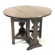 Small late 20th century occasional table, oval drop leaf top, gate action base, shaped end supports