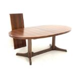 Mid 20th century hardwood veneer extending dining table, the oval top raised on two turned pedestals