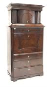 19th century rosewood secretaire, the top section with leaf capped turned pilasters flanking serpen