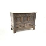 18th century mule chest, plain hinged lid with moulded edge above scroll carved frieze and three car