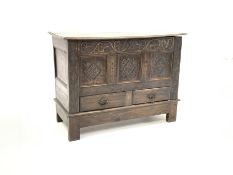18th century mule chest, plain hinged lid with moulded edge above scroll carved frieze and three car