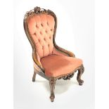 Victorian style beech framed nursing chair, shell and scroll carved cresting rail, upholstered in bu