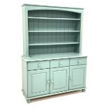 Turquoise blue painted wood kitchen dresser, three heights plate rack above three drawers and three