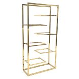 Gilt metal 'Hollywood Regency' etagere, with six cantilevered display shelves, (No glass for shelves