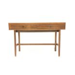 Mid 20th century hardwood veneered console table, with two drawers raised on moulded supports united