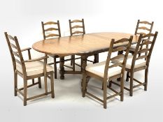 Ercol golden dawn elm extending dining table with fold out leaf (H74cm, 107cm x 162cm - 212cm), and