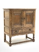 ercol elm cabinet enclosed by two doors with drawer, W79cm, H88cm, D43cm