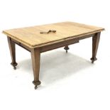 Early 20th century oak dining table, rounded rectangular telescopic extending top with two additiona