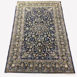 Persian Keshan blue ground rug carpet, central medallion, field decorated with interlacing floral an