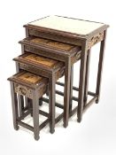 Chinese style heavily carved nest of four tables, W51cm, H67cm, D35cm