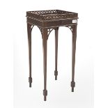 Small 20th century mahogany square urn stand with pull out slide, pierced gallery top and corner bra