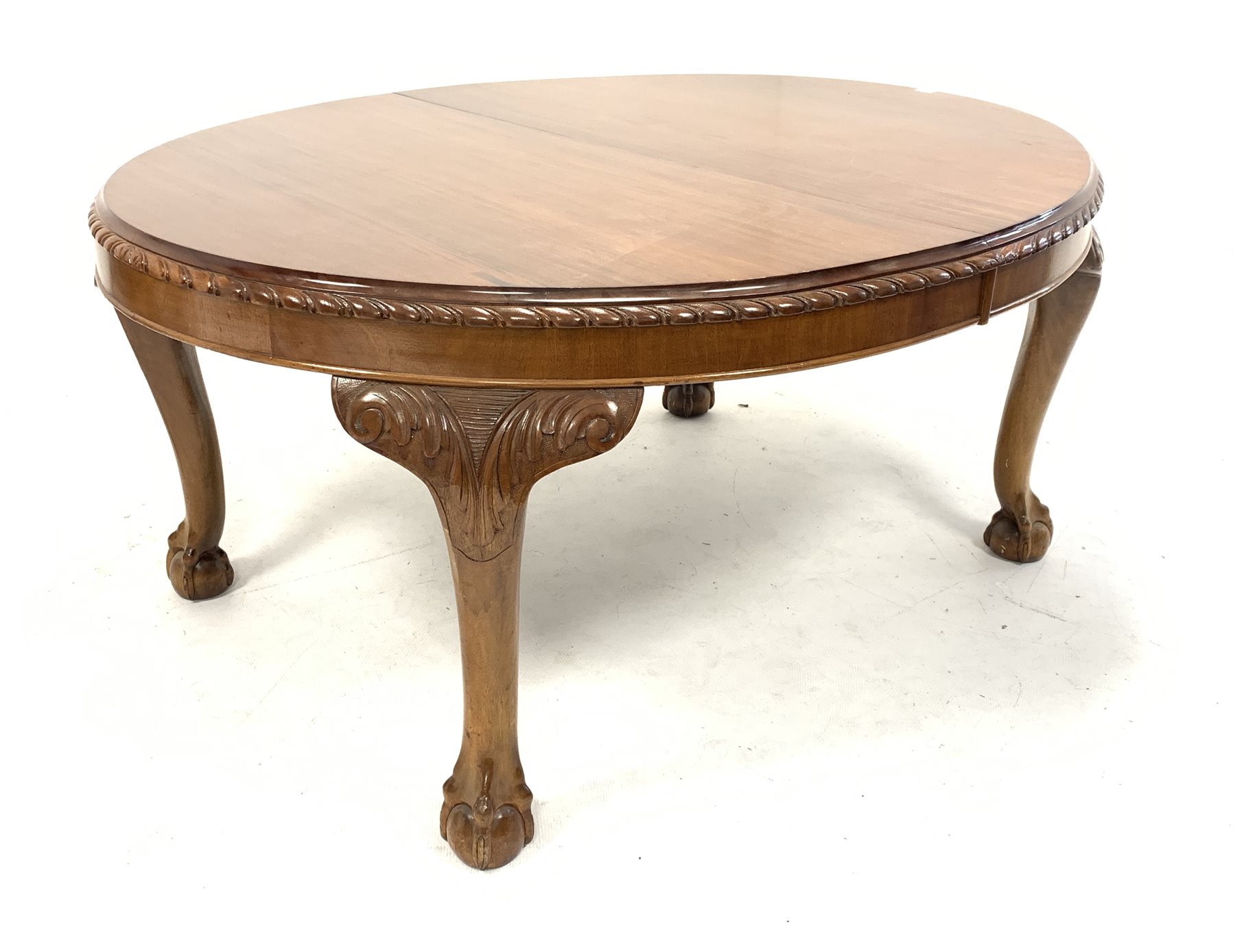 Early 20th century mahogany dining table, oval gadroon carved telescopic extending top with four add - Image 7 of 9