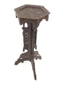 Early 20th century Indian carved table, profusely pierced and carved with flowers and foliage, D36cm