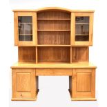 Lee Sinclair - a bespoke late 20th century solid elm dresser, arched top over two glazed doors each