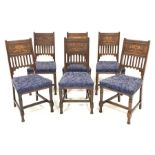 Set six late 19th century Art Nouveau period oak dining chairs with scrolled foliate inlay, upholste