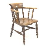 19th century elm and beech smokers bow armchair, shaped and pierced splat and spindle back, turned s