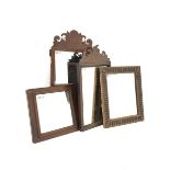 Edwardian mahogany framed wall mirror with reeded decoration, (35cm x 63cm) a similar mahogany mirr