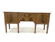 Georgian design mahogany serpentine sideboard, with cross banded top over two drawers and two cupbo