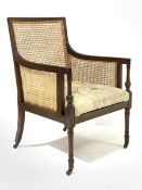 20th century Regency style mahogany bergere armchair, moulded frame, crewel work cover upholstered s