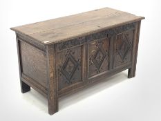 19th century oak coffer, moulded two plank hinged top, guilloche carved frieze above three panels ca