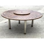 Large circular teak garden table, D182cm, H74cm