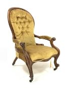 Victorian walnut framed open armchair with upholstered buttoned spoon back, carved frame with scroll