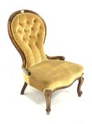 Victorian style stained beech framed spoon back nursing chair upholstered in buttoned pale green fab