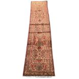 Persian red and pink ground runner rug, overall floral design with Herati motifs, guarded border dec