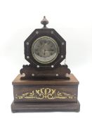 Regency period rosewood cased mantel clock, octagonal top with finial, silvered engine turned Roman