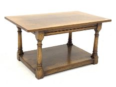 Oak rectangular top coffee table on turned supports joined by undertier, 92cm x 56cm, H48cm
