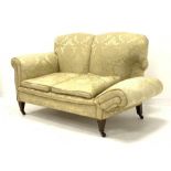 Early 20th century two seat settee with drop end, upholstered in pale gold Damask fabric, square tap