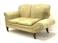 Early 20th century two seat settee with drop end, upholstered in pale gold Damask fabric, square tap