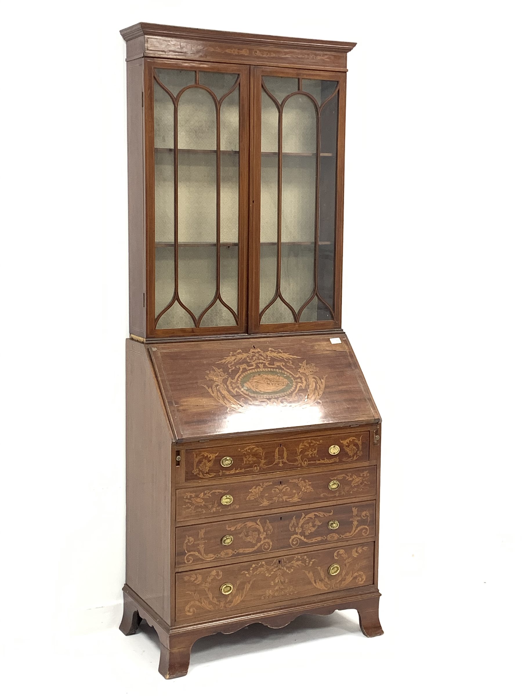 Edwardian mahogany bureau bookcase, the upper section enclosed by a pair of glazed tracery doors, wi