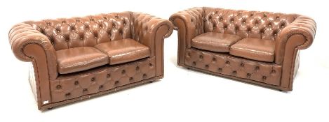 Pair of Brown leather two seat chesterfields, deep buttoned, raised on castors, W152cm