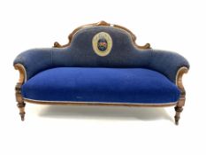 Victorian mahogany framed three seat sofa, scrolled serpentine cresting rail over swept arms, covere