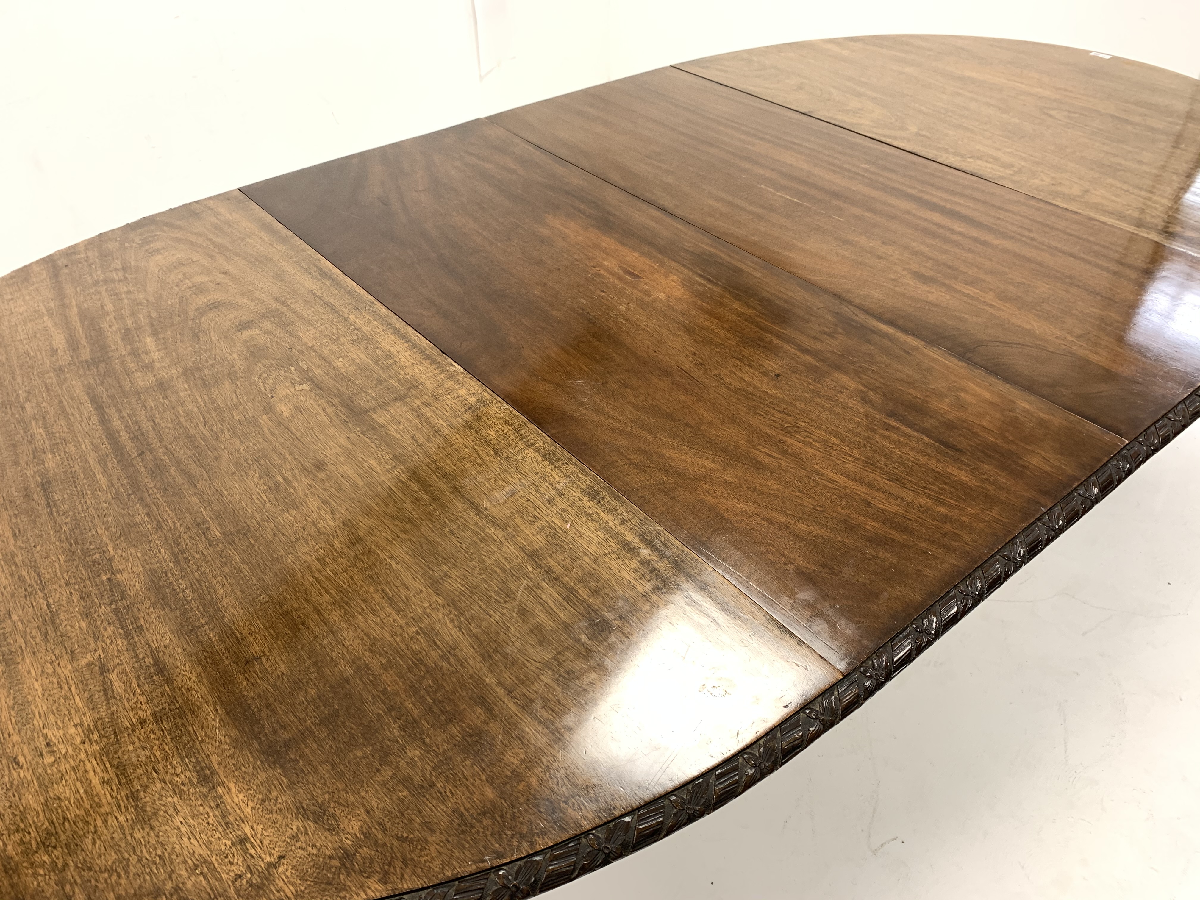 Early 20th century mahogany extending dining table, the oval top with floral edging over acanthus ca - Image 3 of 5