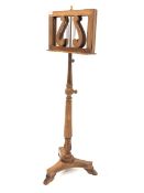 Quality mahogany duet easel music stand of lyre form, raised on reeded and leaf carved column over p