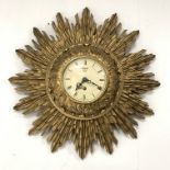 Smiths giltwood starburst wall clock, with white enamel dial and Roman numeral chapter ring, eight d