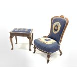 Victorian mahogany framed nursing chair, shaped cresting rail over needlework upholstered seat and b