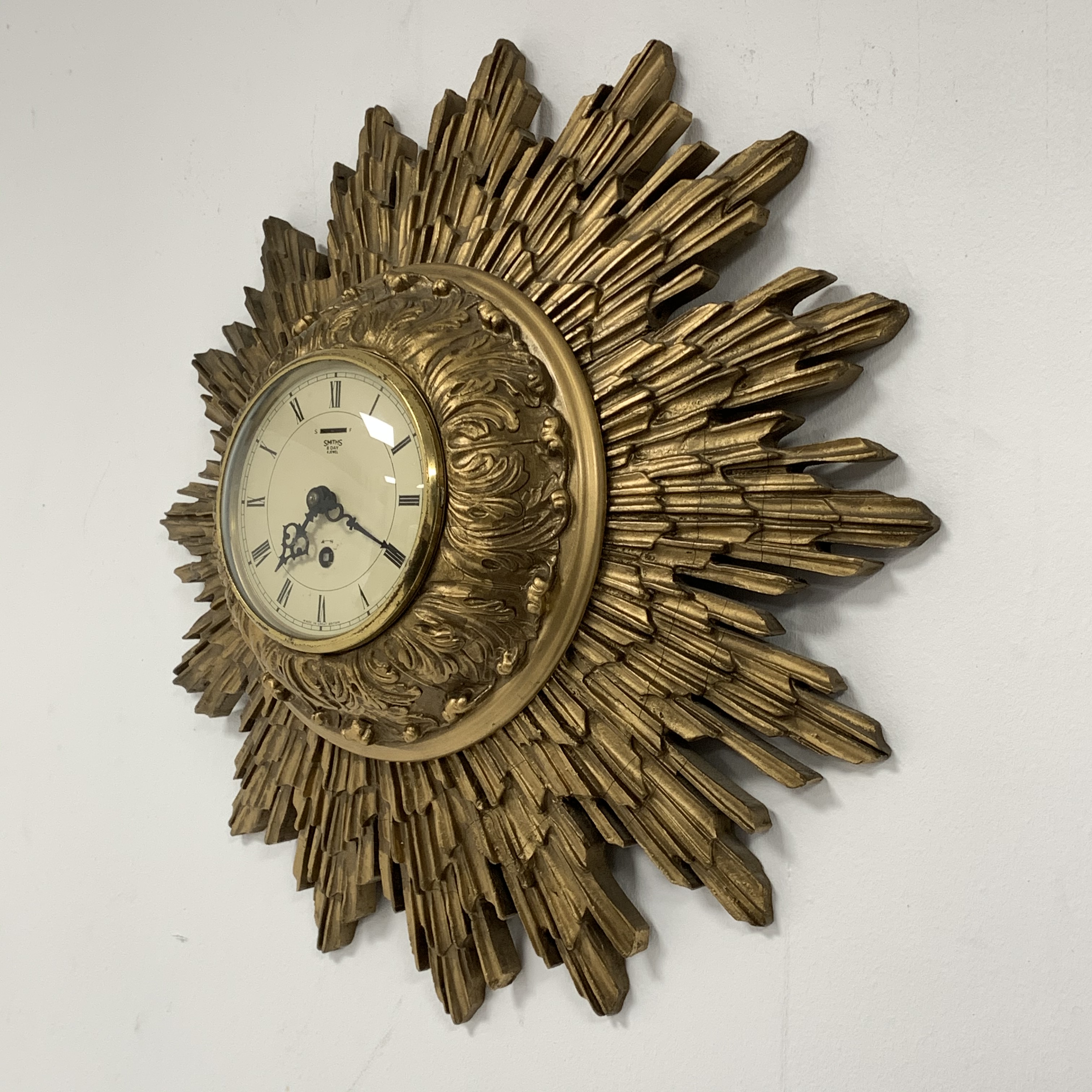 Smiths giltwood starburst wall clock, with white enamel dial and Roman numeral chapter ring, eight d - Image 2 of 3