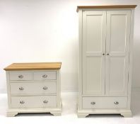 Contemporary oak and cream finish double wardrobe, with interior fitted with shelf and for hanging o