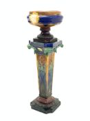 Victorian design ceramic jardini�re and stand, decorated with masks and scrolled foliage, H109cm