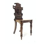 Victorian mahogany shield back hall chair, with shaped seat, raised on turned front supports, W46cm