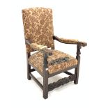 18th century style walnut open armchair, upholstered in floral silk, leaf carved and scrolled arm re