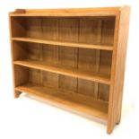'Eagleman' oak open bookcase, with adzed and shaped panel end supports supporting three shelves, W12
